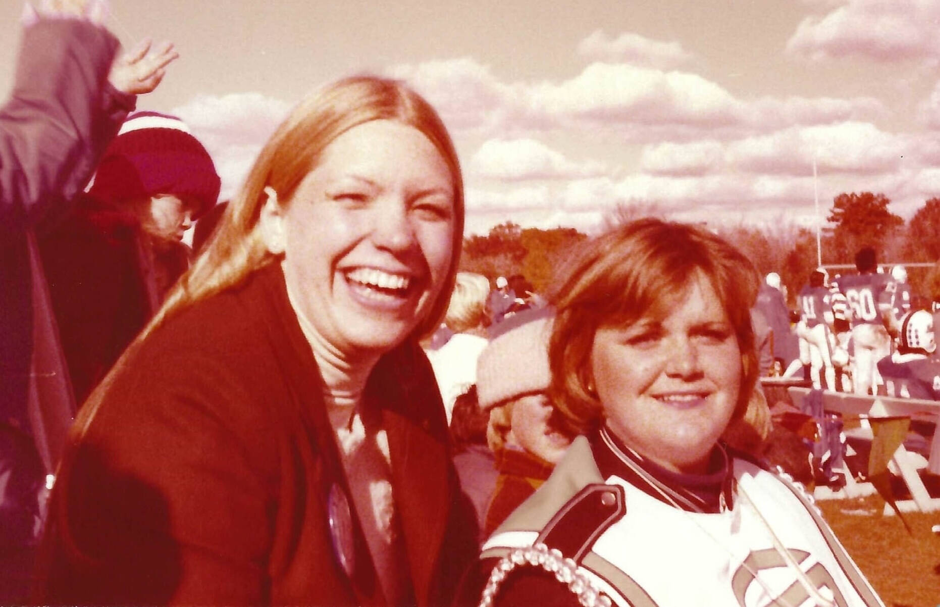 Maris Timmer Tracy ’78, left, and Kathleen (Ure) Bell ’81 are pictured at Homecoming 1978, prior to receiving their prizes for the Lyrics Contest.